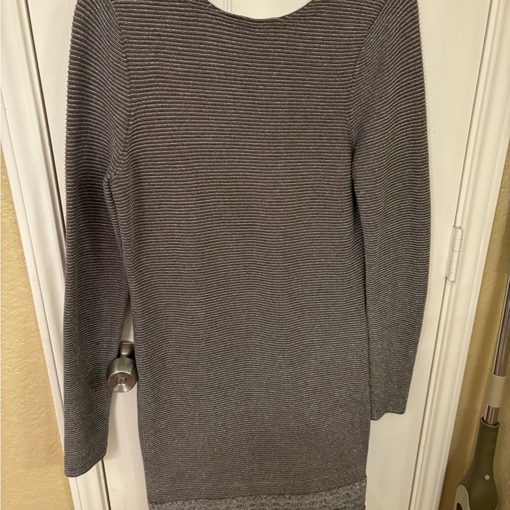 It’s a long sleeve backless knit, very dressy.